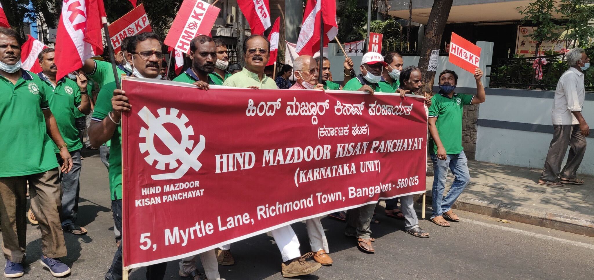 HMKP Karnataka Unit demonstration with organizational banner